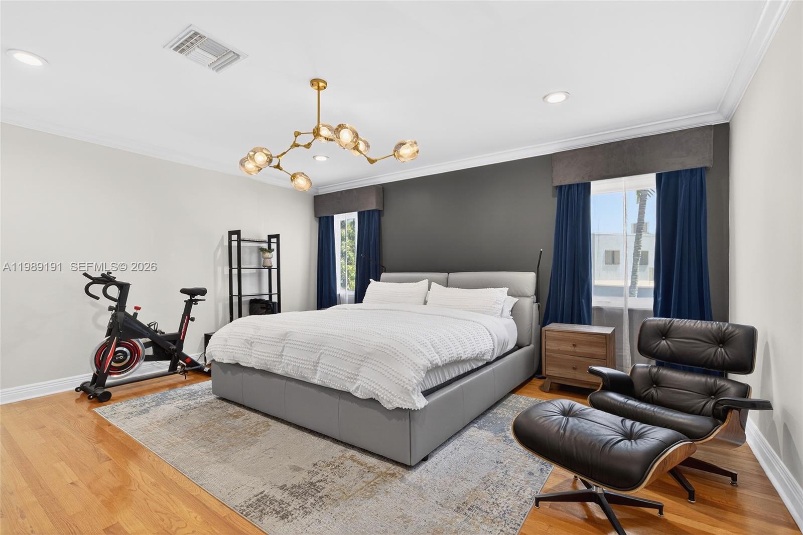 2431 Southwest 4th Street Miami, FL 33135 - Photo 30 of 33 a bedroom with a bed and wooden furniture