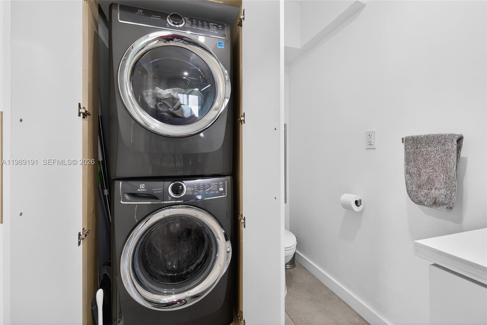 2431 Southwest 4th Street Miami, FL 33135 - Photo 10 of 33 a utility room with dryer and washer