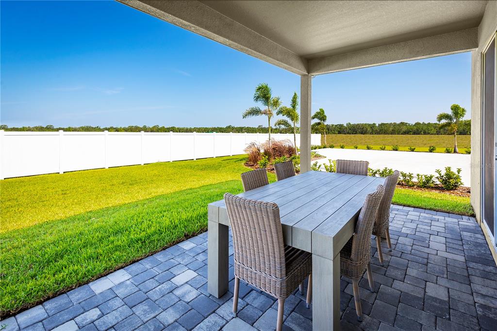 4641 Spire Run Lakewood Ranch, FL 34211 - Photo 21 of 21 a view of a swimming pool and an ocean view