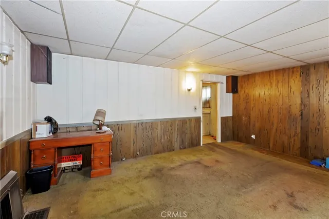 a bed room with a bed and a table