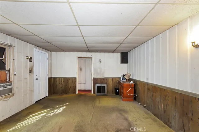a view of a livingroom with furniture and storage