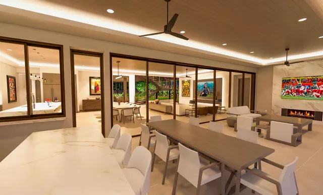 a room with lots of furniture and a large window