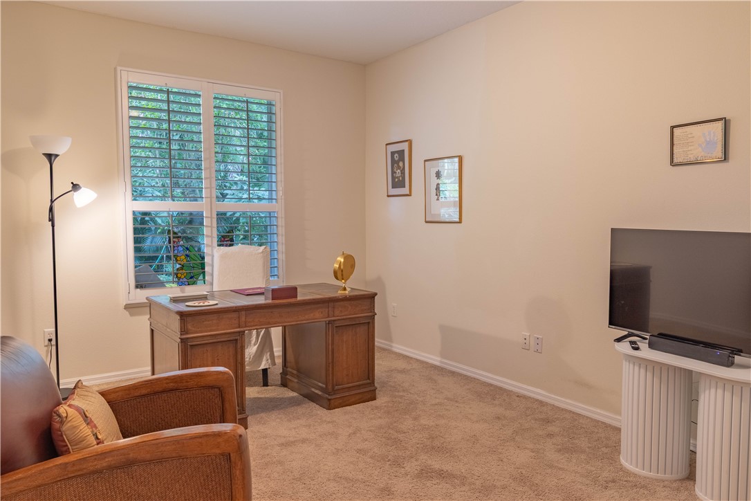 671 Gossamer Wing Way Sebastian, FL 32958 - Photo 23 of 36 a view of a livingroom with furniture and a flat screen tv