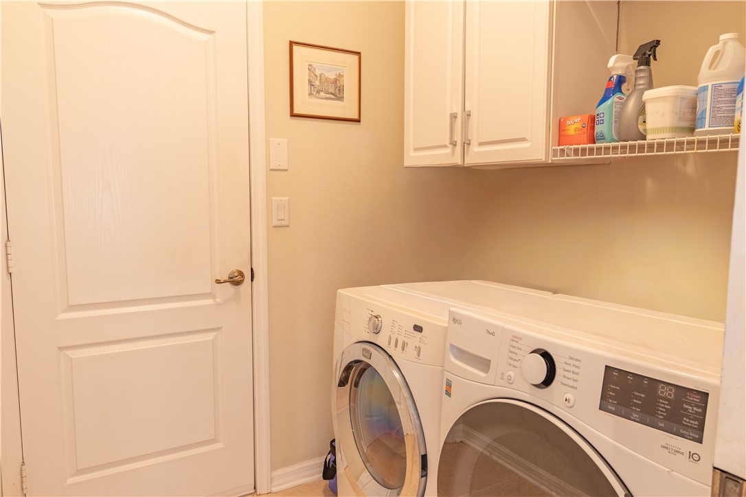 671 Gossamer Wing Way Sebastian, FL 32958 - Photo 24 of 36 a utility room with dryer and washer