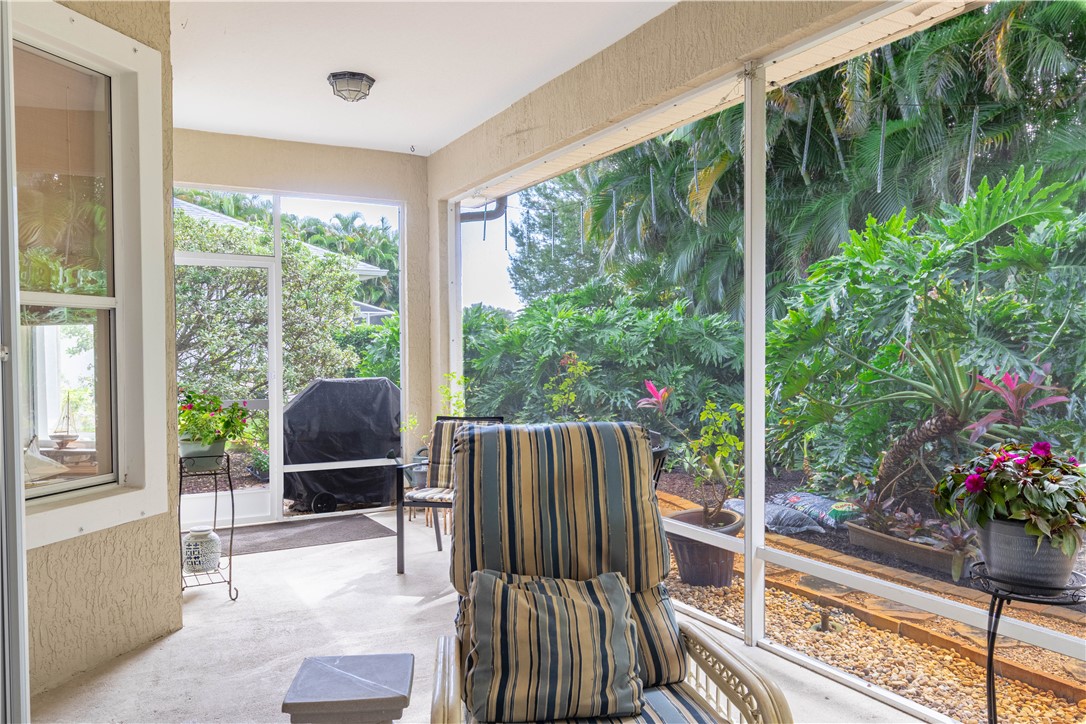 671 Gossamer Wing Way Sebastian, FL 32958 - Photo 30 of 36 a view of balcony with furniture and garden