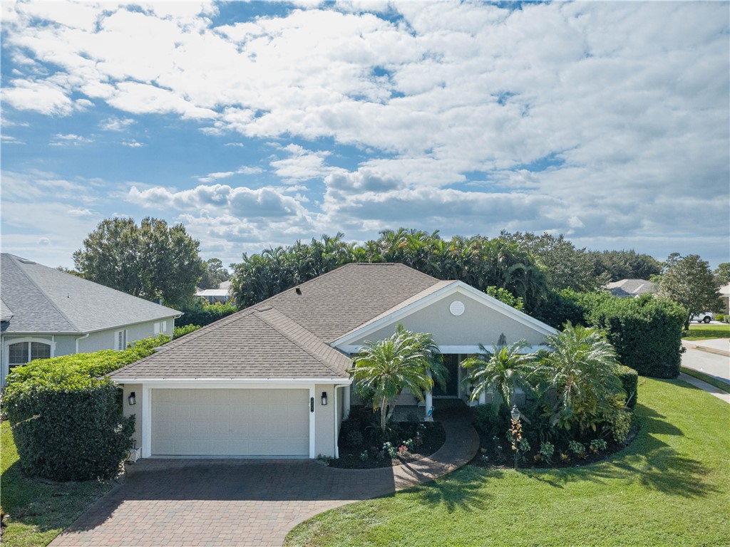 671 Gossamer Wing Way Sebastian, FL 32958 - Photo 4 of 36 a aerial view of a house with garden