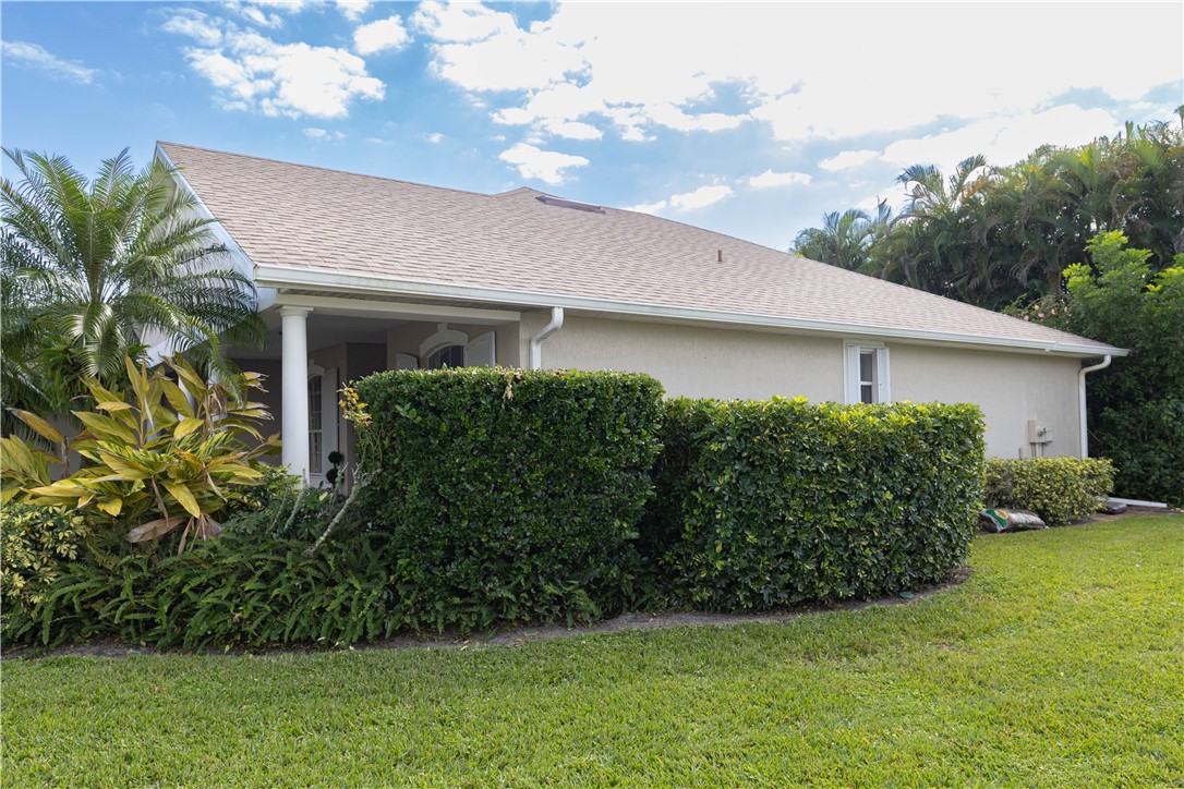 671 Gossamer Wing Way Sebastian, FL 32958 - Photo 7 of 36 a front view of a house with garden