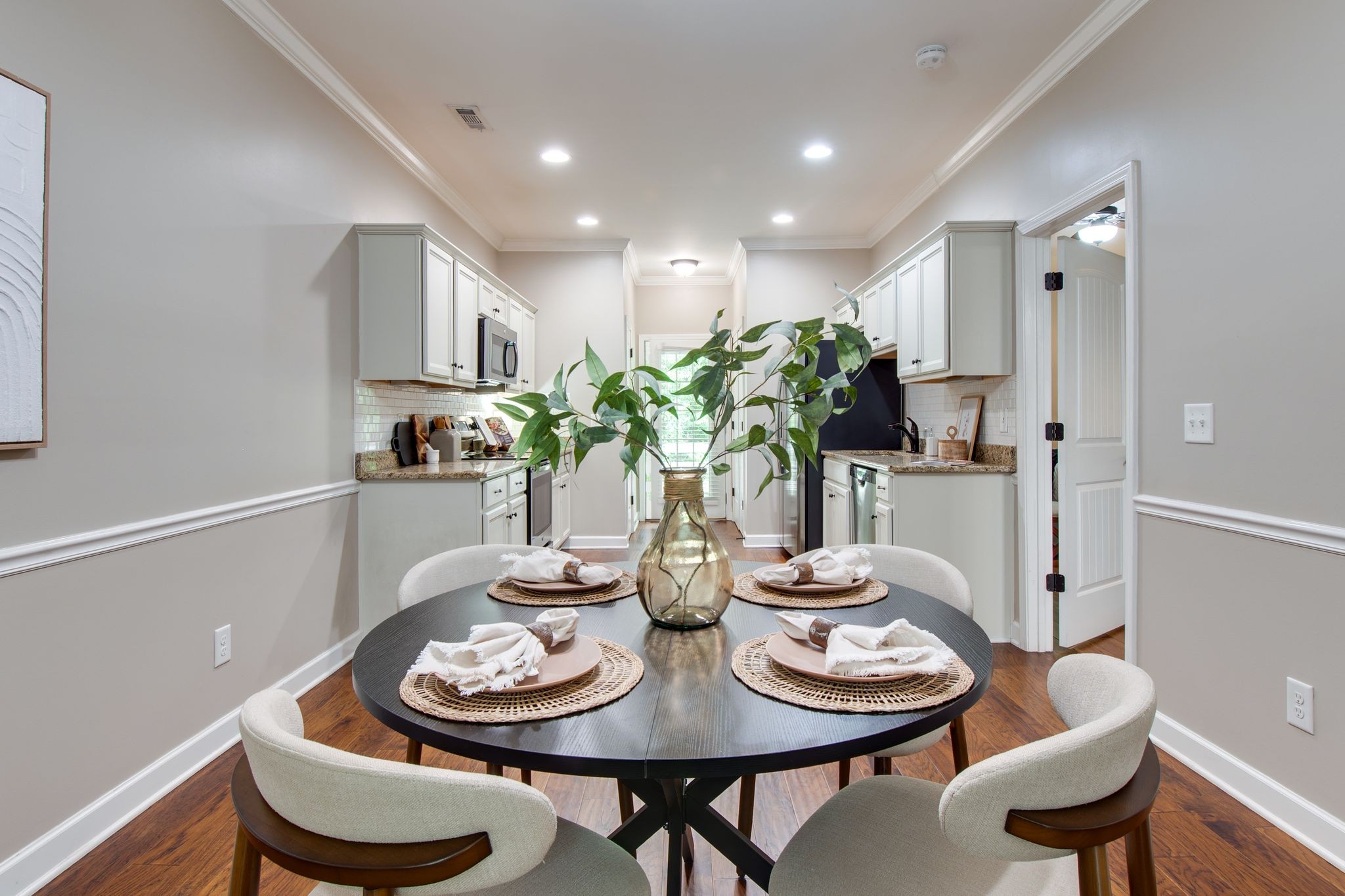 149 Velena Street Franklin, TN 37064 - Photo 11 of 27 a view of a dining room with furniture and wooden floor