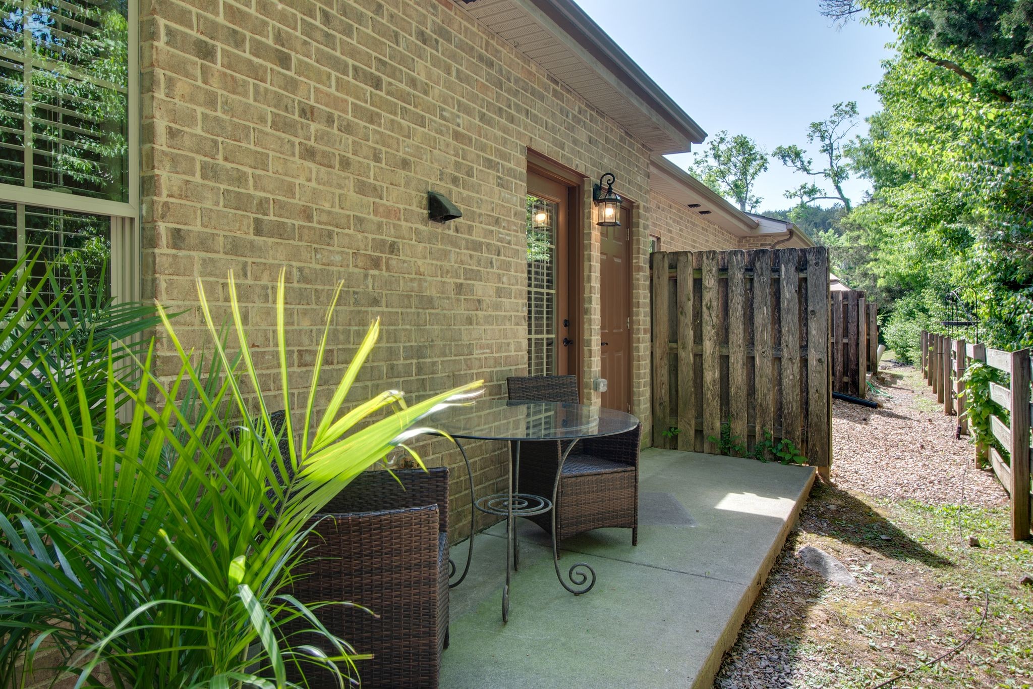 149 Velena Street Franklin, TN 37064 - Photo 26 of 27 a backyard of a house with table and chairs
