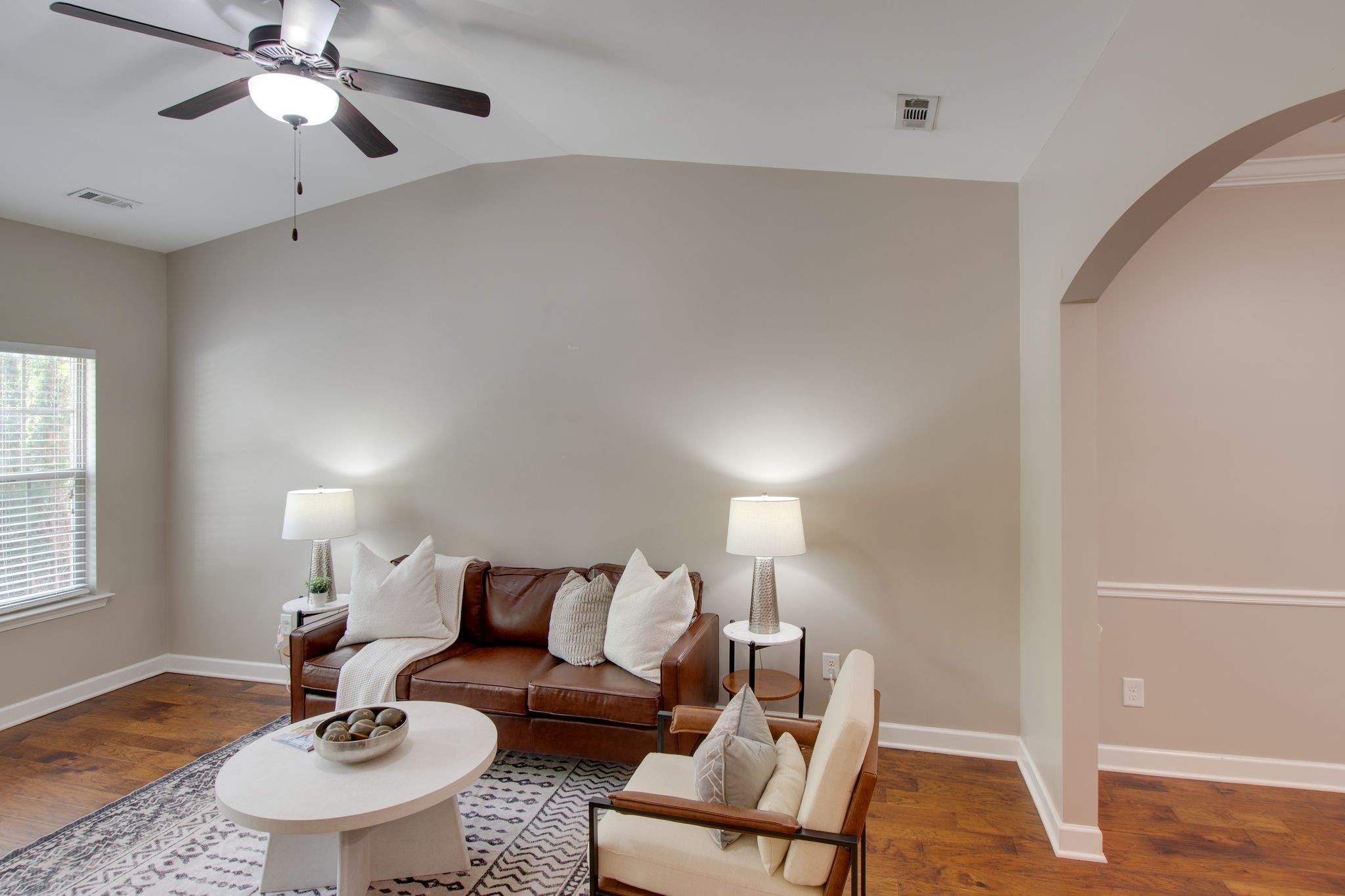 149 Velena Street Franklin, TN 37064 - Photo 9 of 27 a living room with furniture and a wooden floor