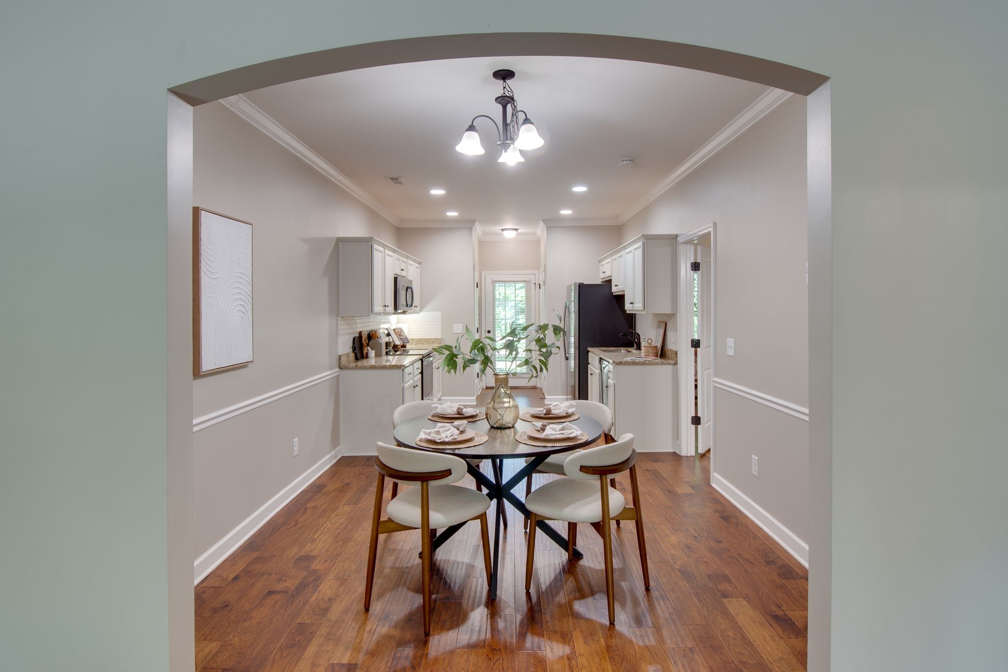 149 Velena Street Franklin, TN 37064 - Photo 10 of 27 a view of a dining room with furniture and wooden floor