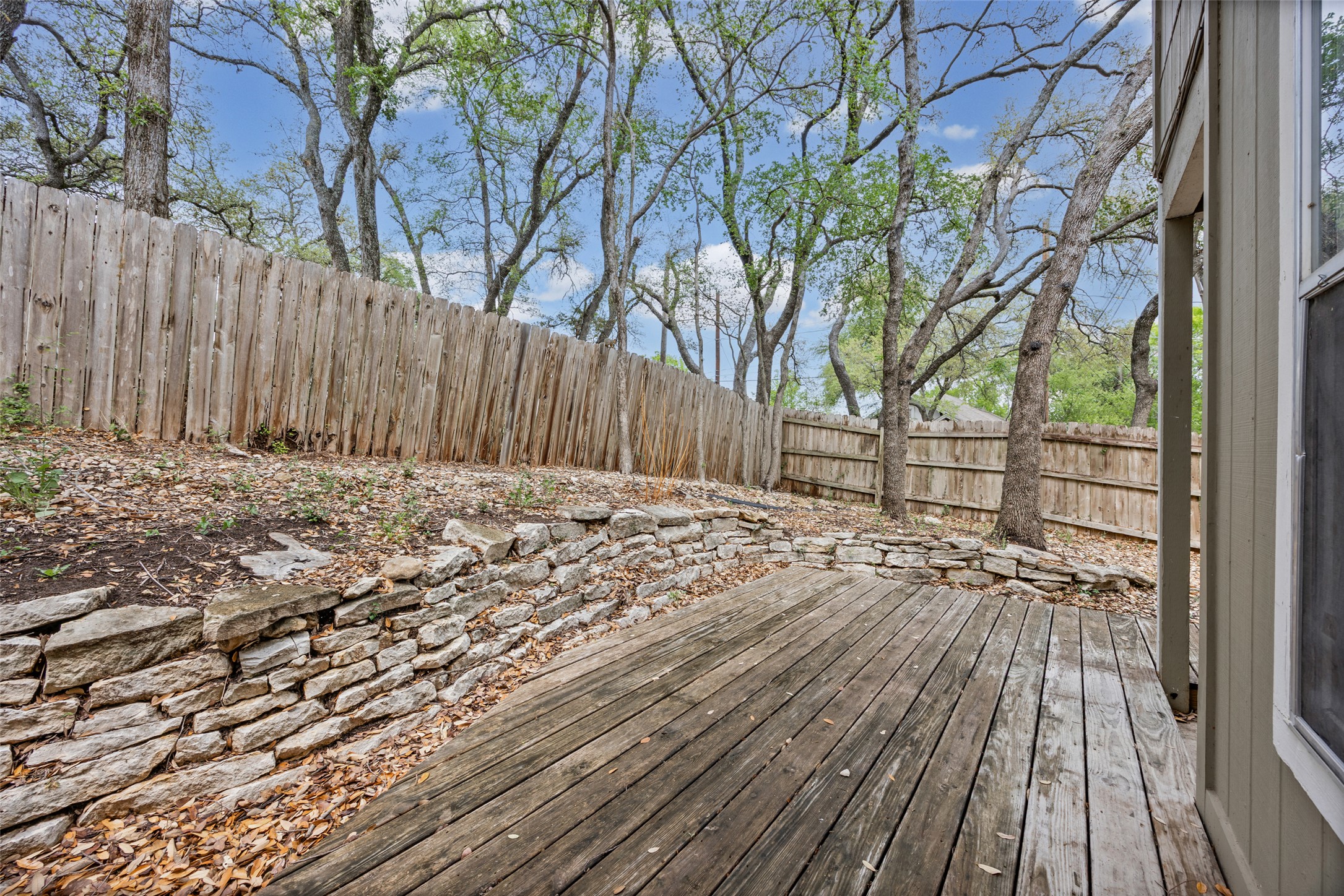 8100 Dunn Street, Unit B Austin, TX 78745 - Photo 23 of 29 a view of wooden deck