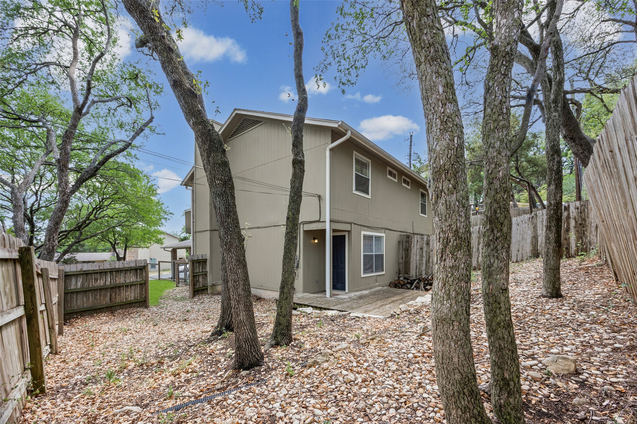 8100 Dunn Street, Unit B Austin, TX 78745 - Photo 24 of 29 a house view with a outdoor space