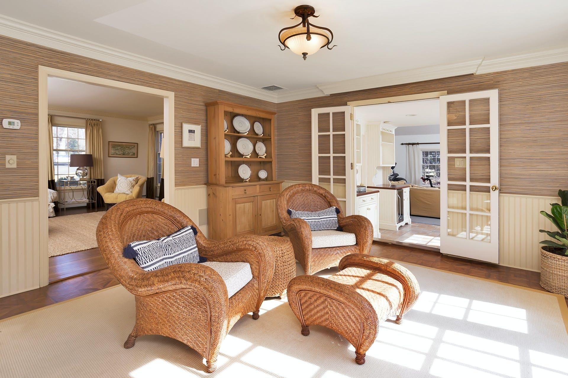 100 Stephen Mather Road Darien, CT 06820 - Photo 16 of 38 a living room with furniture ceiling fan and a rug
