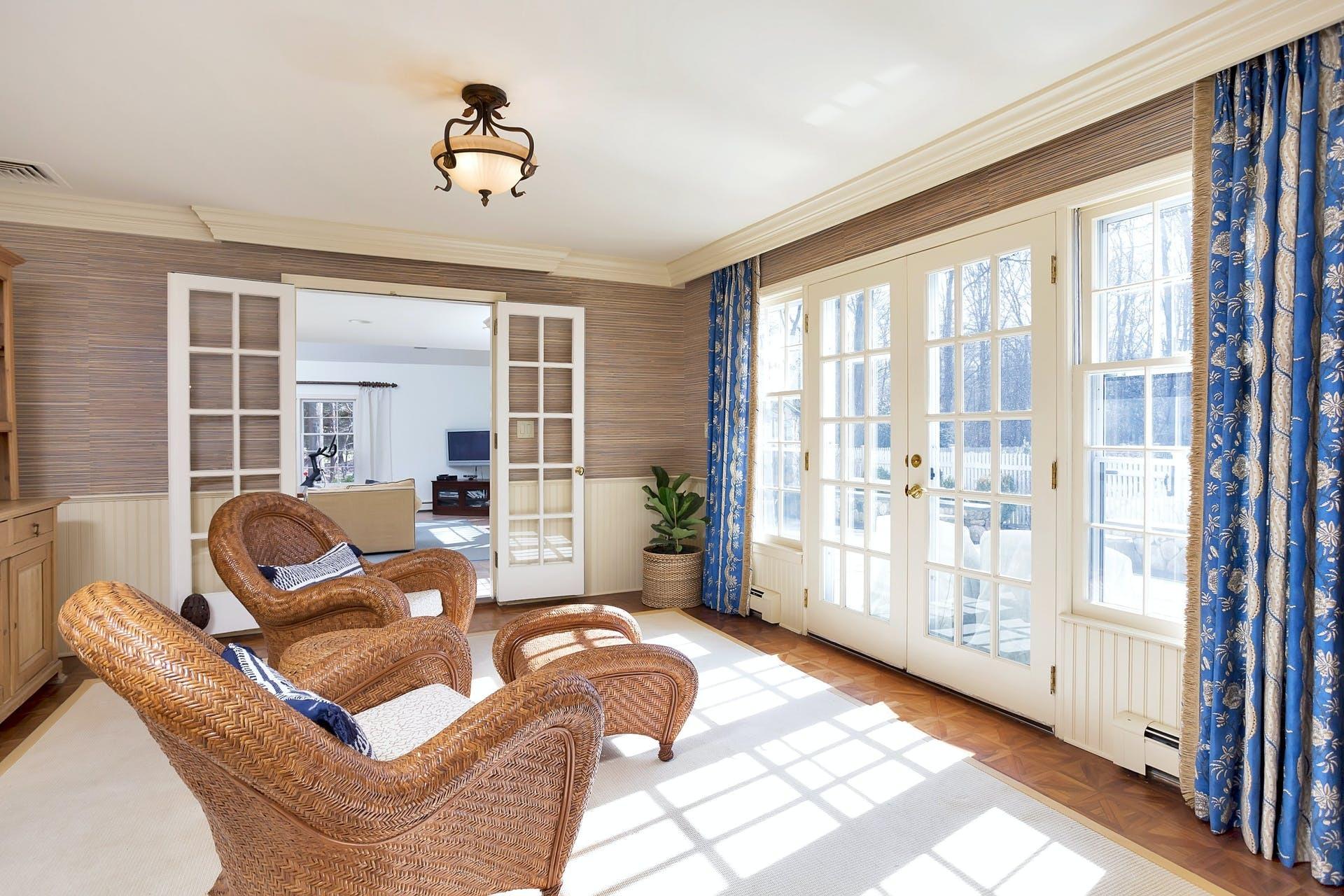 100 Stephen Mather Road Darien, CT 06820 - Photo 17 of 38 a living room with furniture and a large window