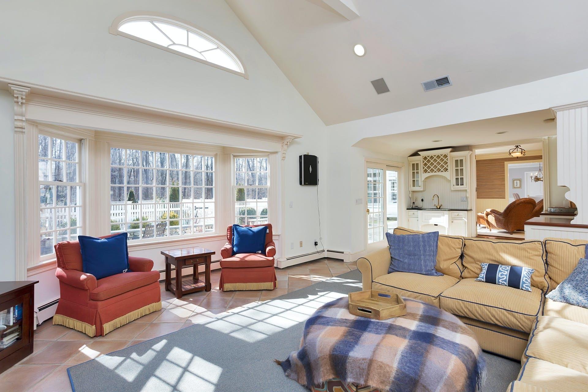 100 Stephen Mather Road Darien, CT 06820 - Photo 21 of 38 a living room with furniture and a large window