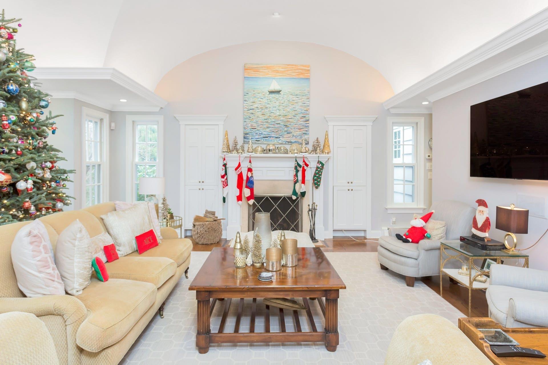 100 Stephen Mather Road Darien, CT 06820 - Photo 4 of 38 a living room with furniture and a flat screen tv