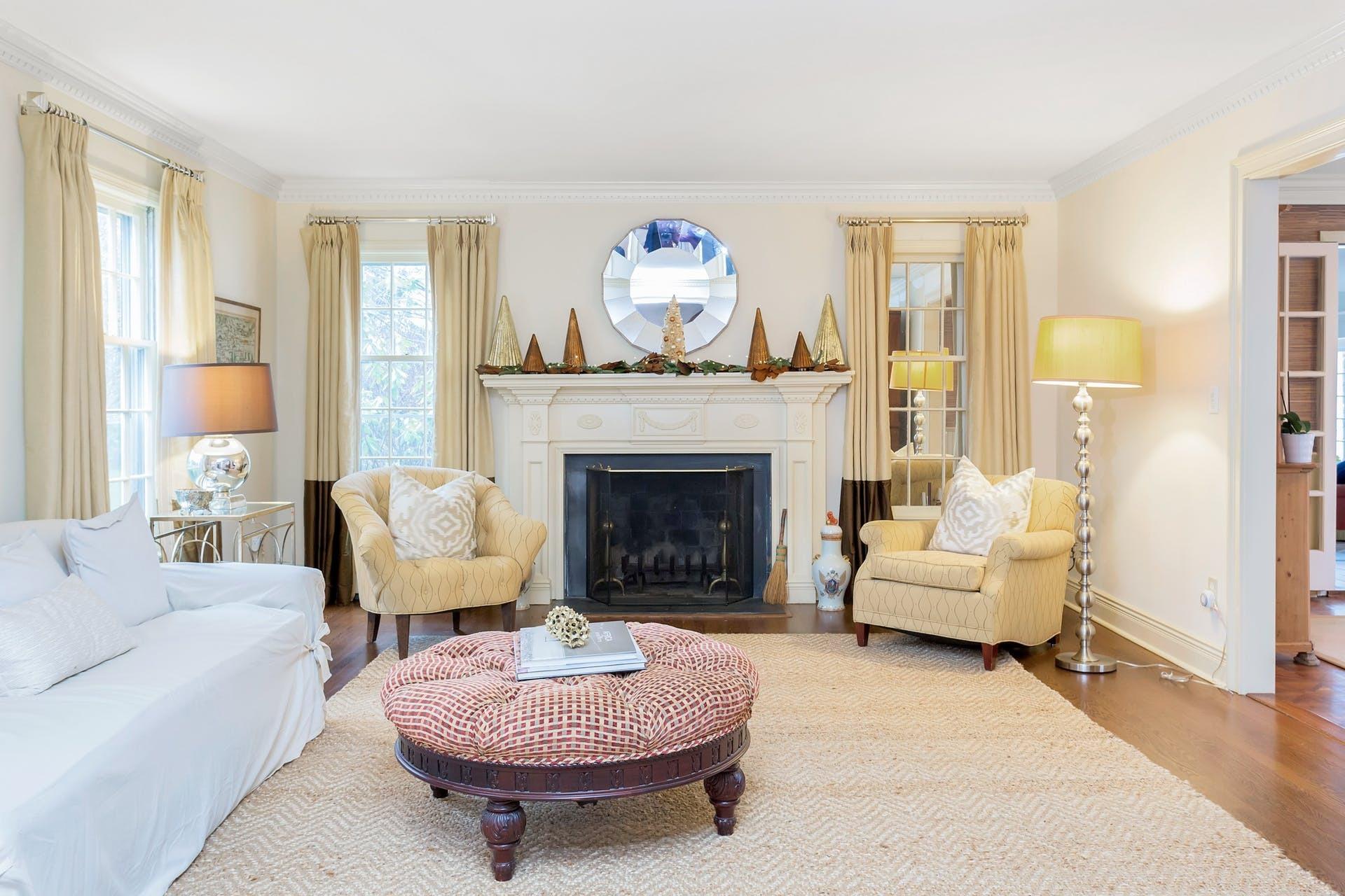 100 Stephen Mather Road Darien, CT 06820 - Photo 10 of 38 a living room with furniture and a fireplace