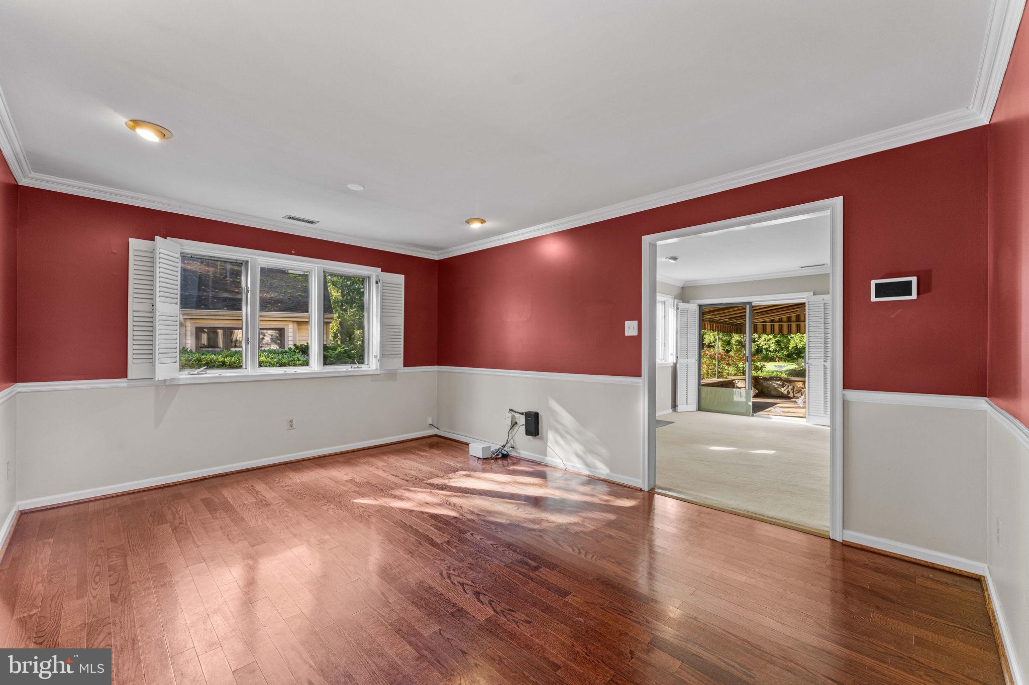 975 Kennett Way West Chester, PA 19380 - Photo 13 of 48 a view of an empty room with wooden floor and a window