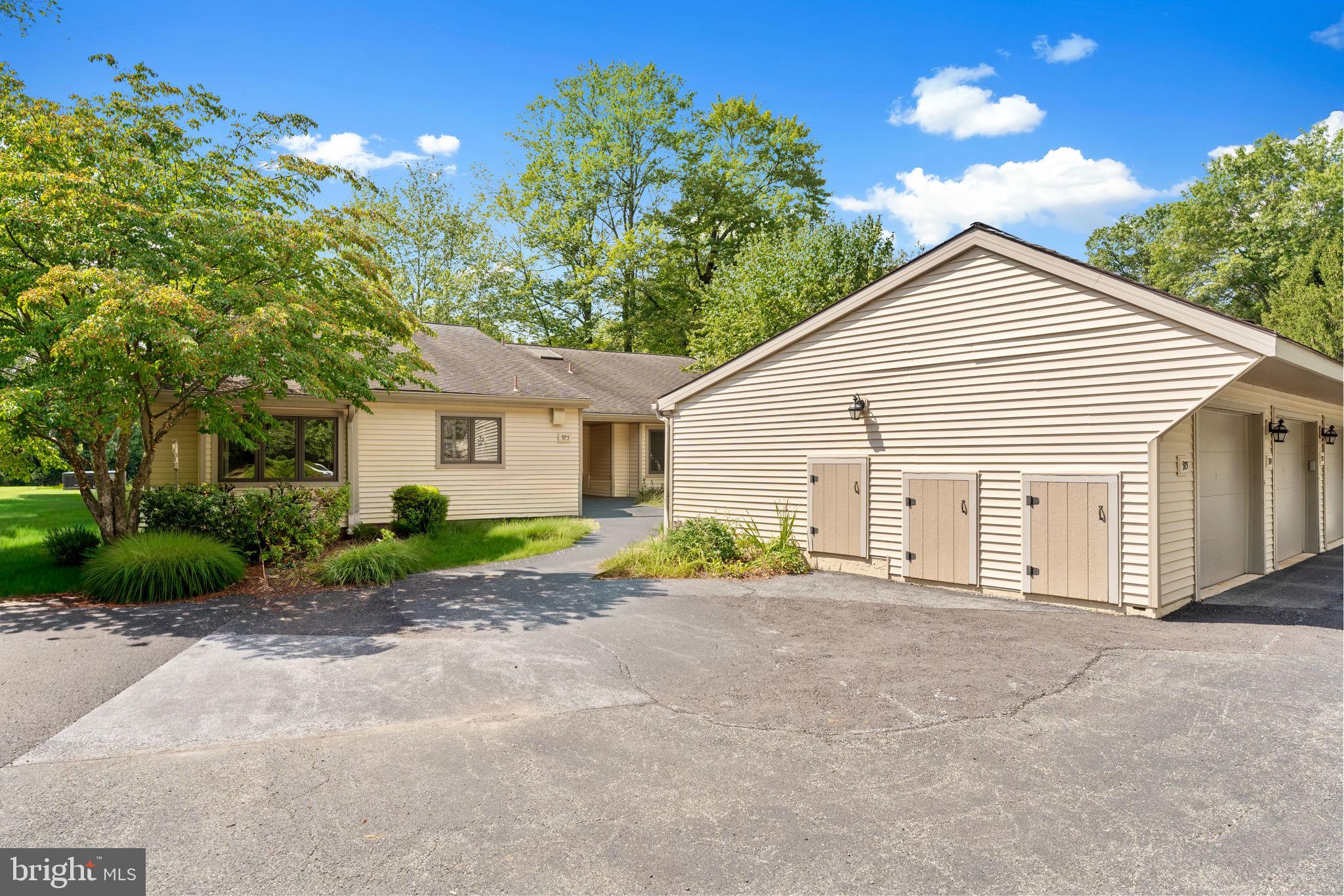975 Kennett Way West Chester, PA 19380 - Photo 2 of 48 a view of a house with a yard and potted plants