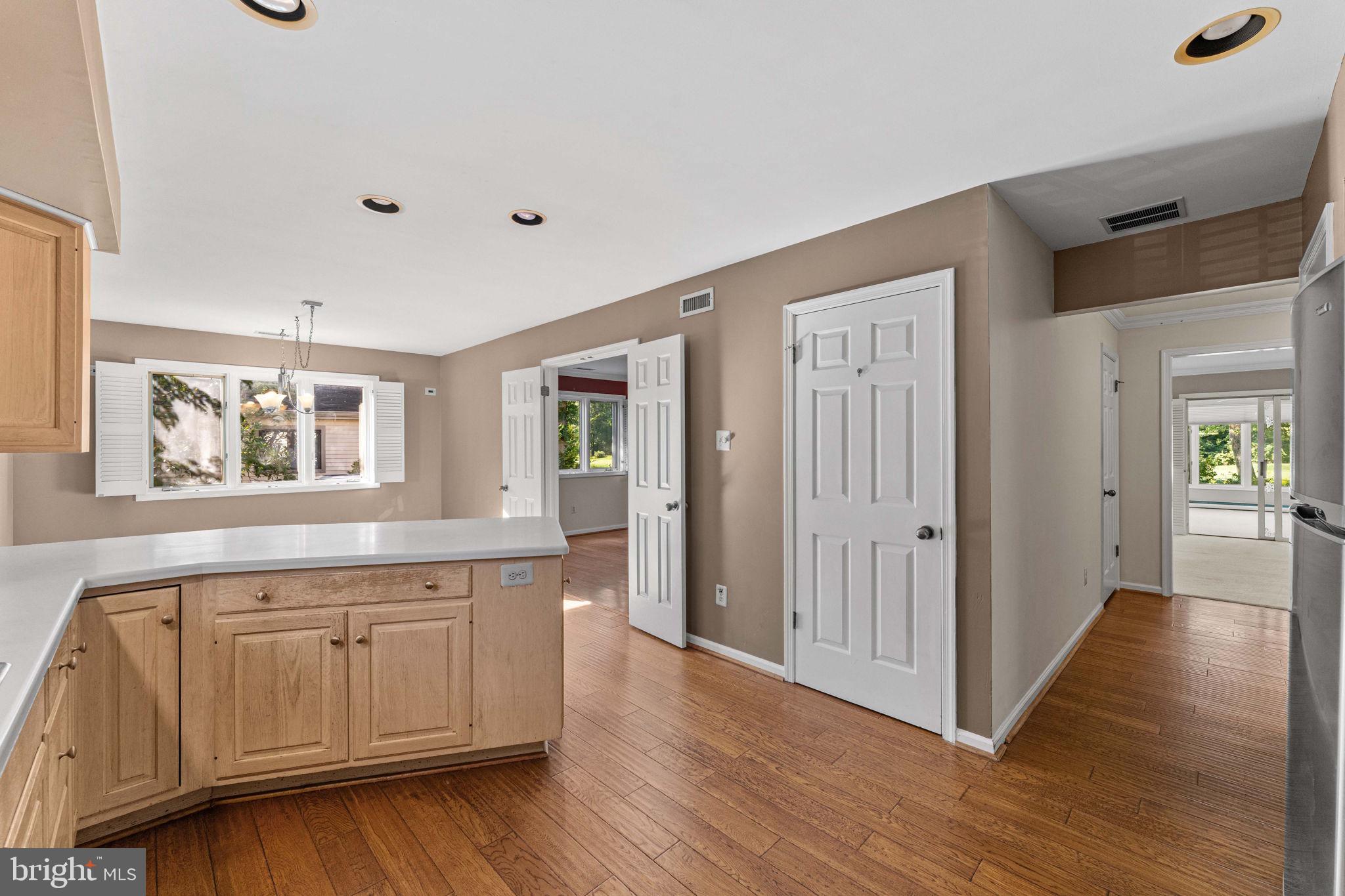 975 Kennett Way West Chester, PA 19380 - Photo 22 of 48 a living room with wooden floors and cabinet