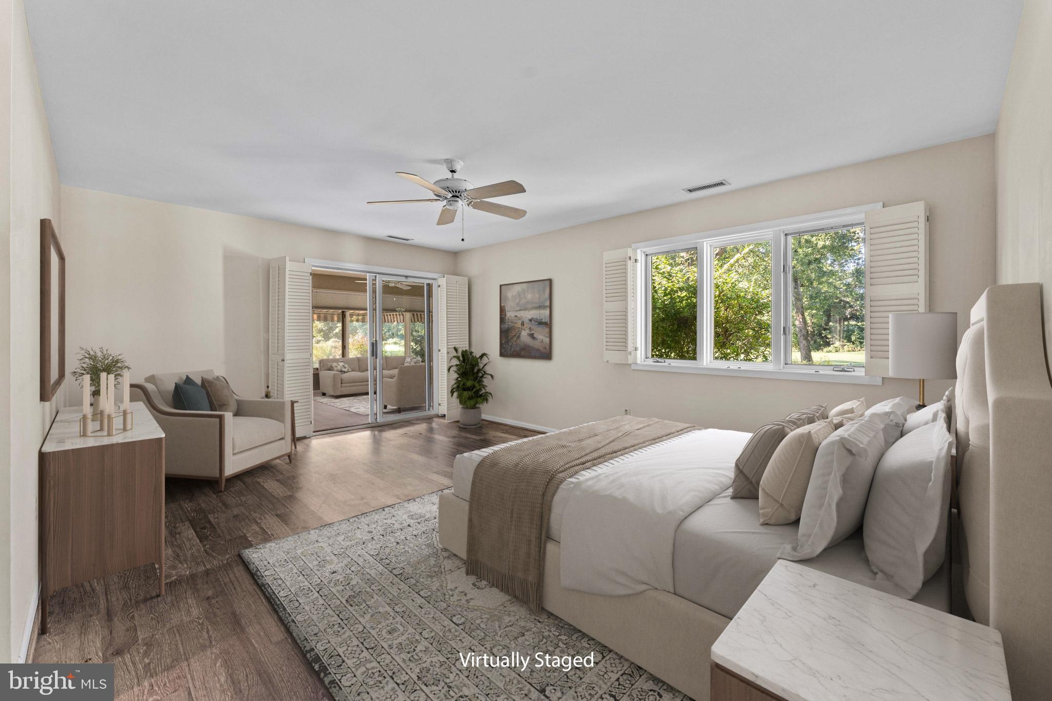 975 Kennett Way West Chester, PA 19380 - Photo 23 of 48 a spacious bedroom with a bed couch and window
