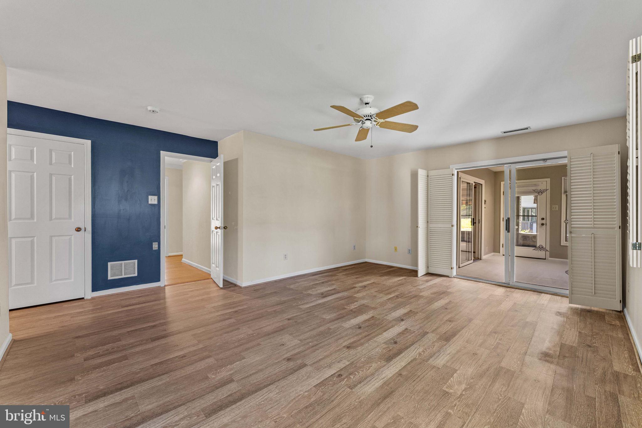 975 Kennett Way West Chester, PA 19380 - Photo 25 of 48 a view of an empty room with window and wooden floor