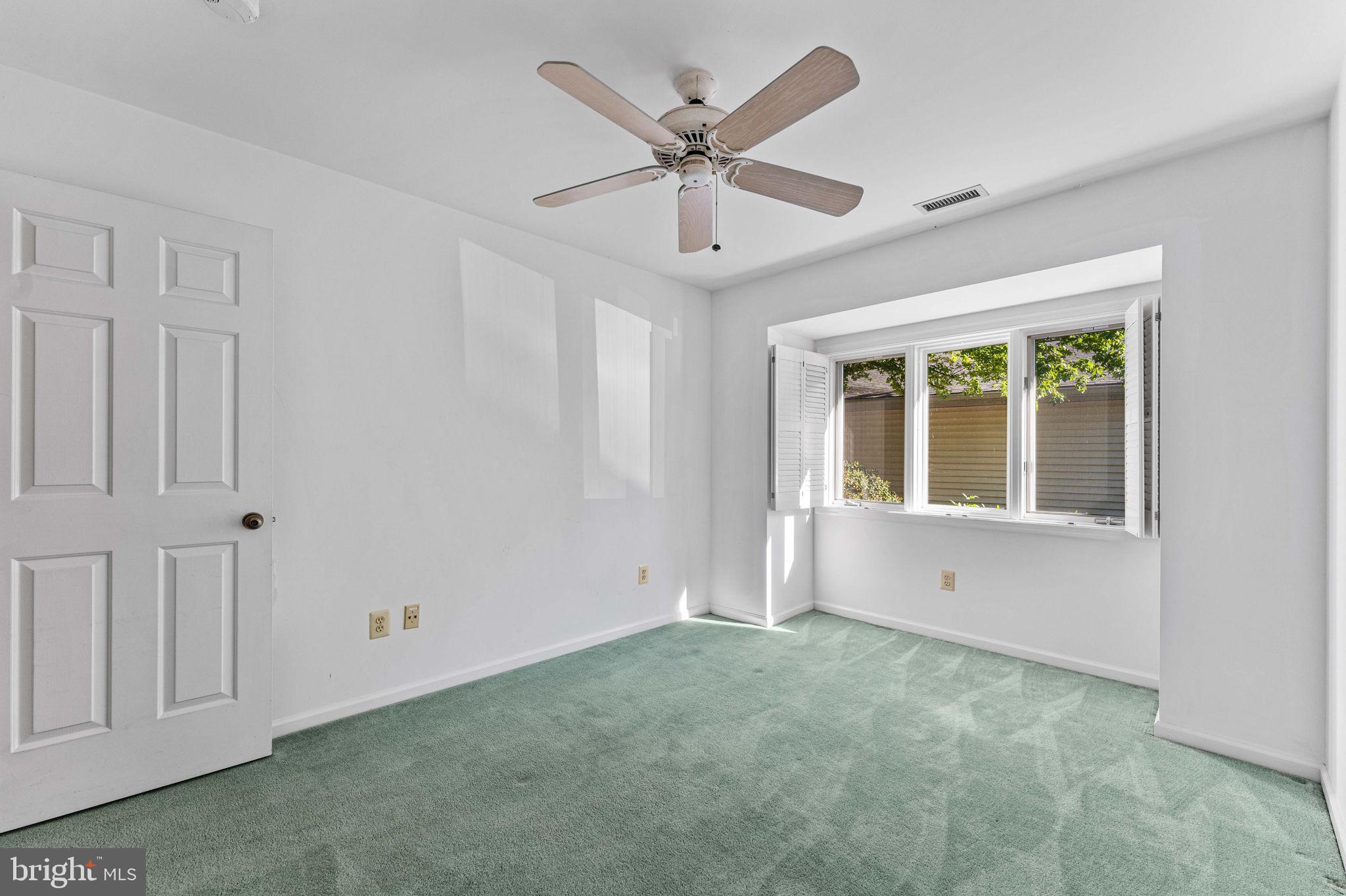 975 Kennett Way West Chester, PA 19380 - Photo 31 of 48 a view of an empty room with a window