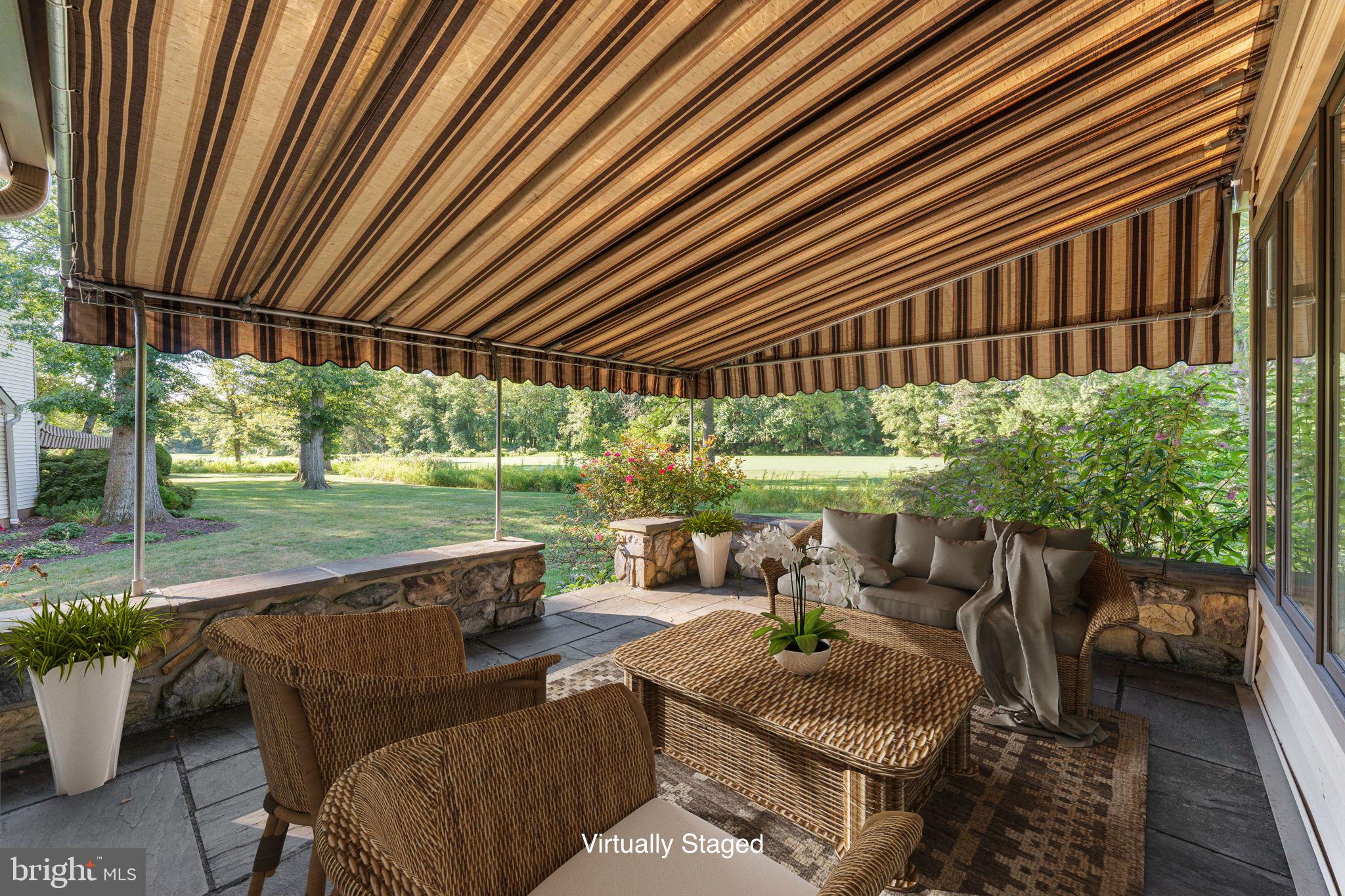 975 Kennett Way West Chester, PA 19380 - Photo 36 of 48 a view of a patio with couches chairs and a table and chairs