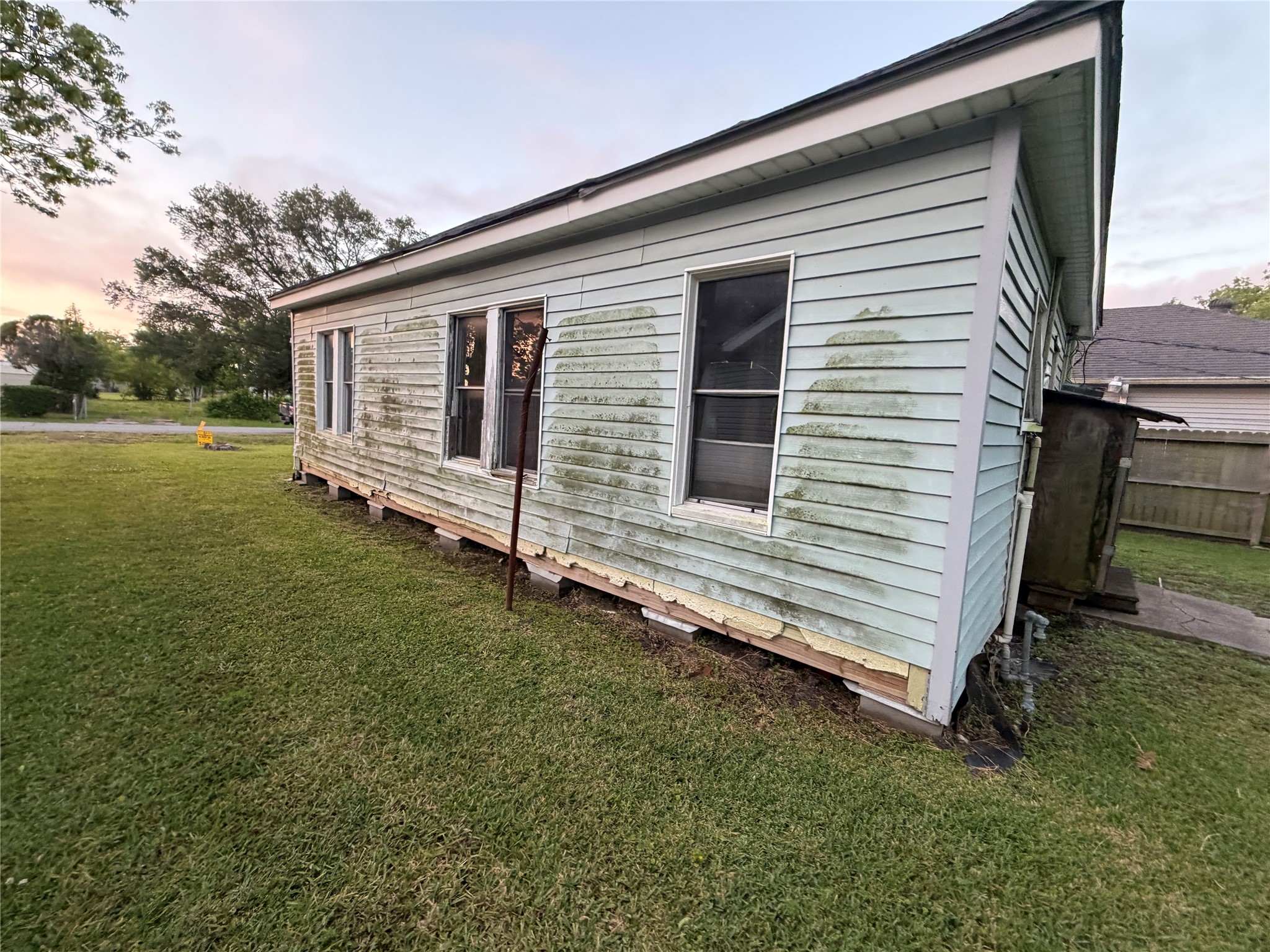 845 13th Street Port Arthur, TX 77640 - Photo 12 of 12 a view of a house with a yard