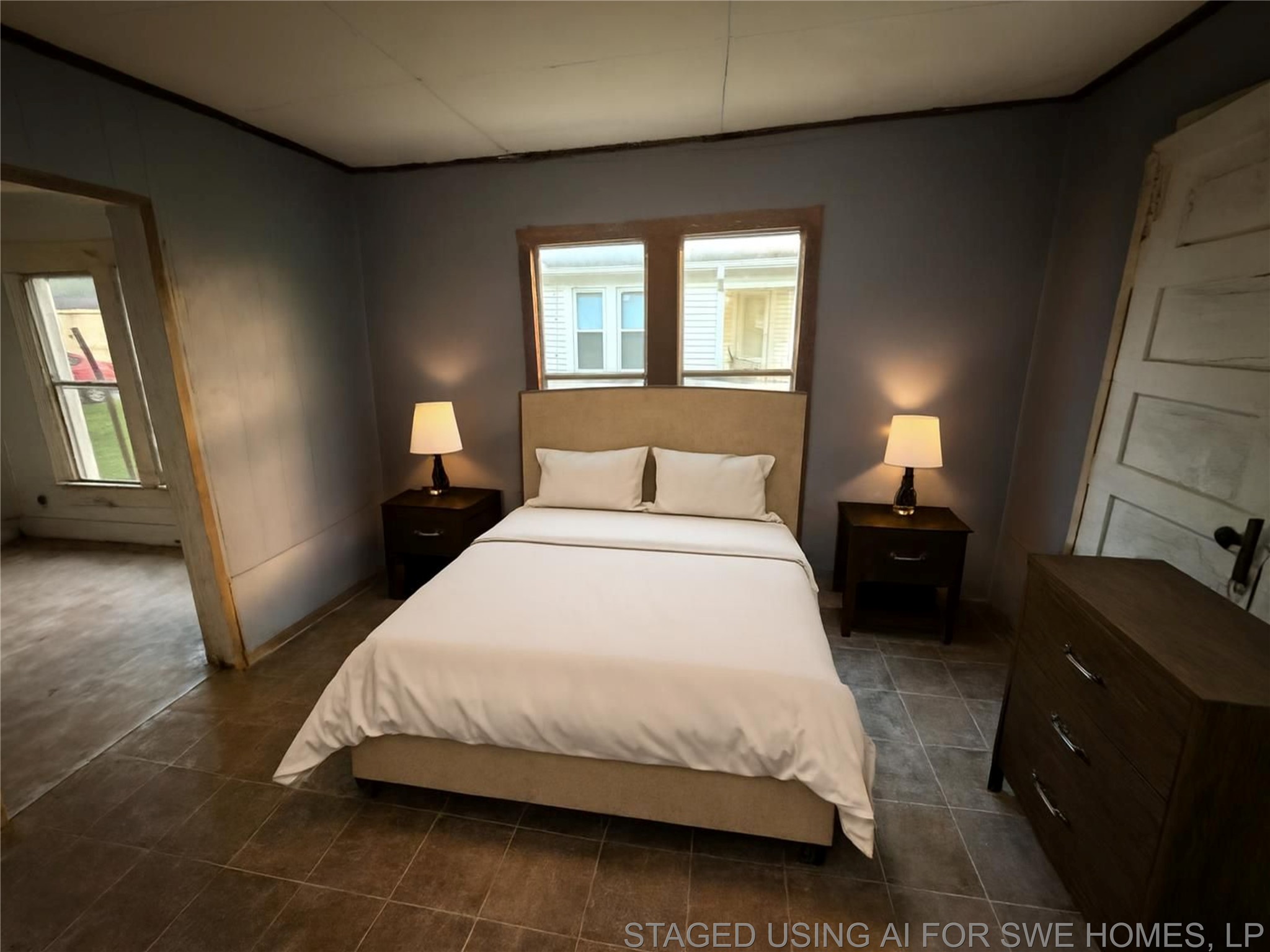 845 13th Street Port Arthur, TX 77640 - Photo 9 of 12 a bedroom with a bed and a couch