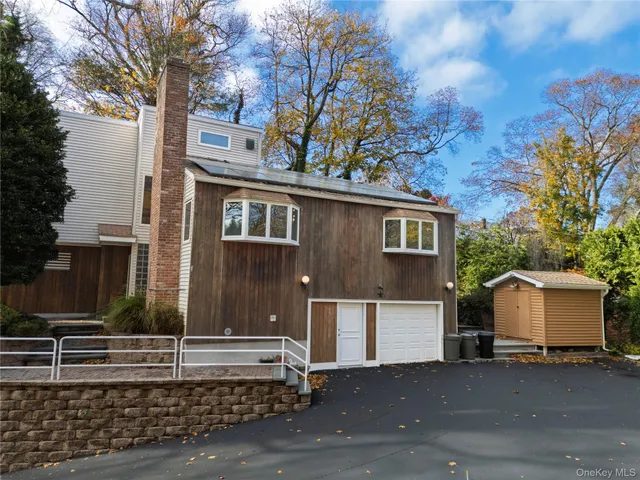 a front view of a house with a garage