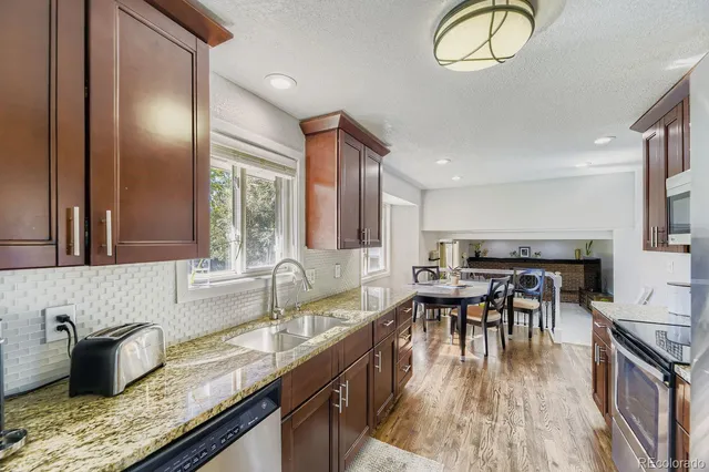 a kitchen with granite countertop lots of counter top space