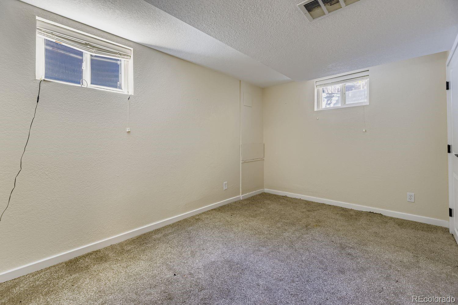 7161 South Franklin Street Centennial, CO 80122 - Photo 21 of 28 an empty room with windows