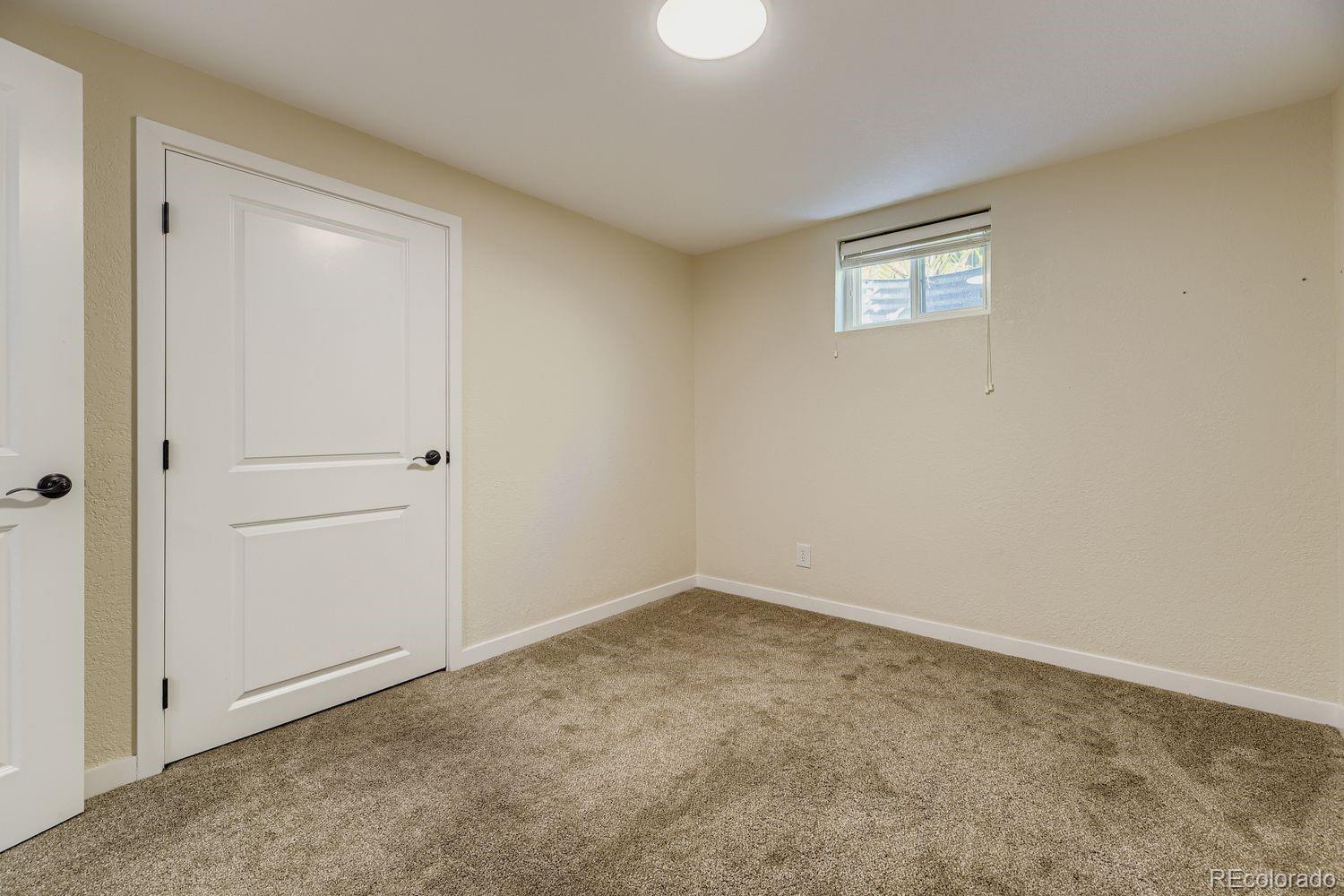 7161 South Franklin Street Centennial, CO 80122 - Photo 22 of 28 a view of an empty room with a window