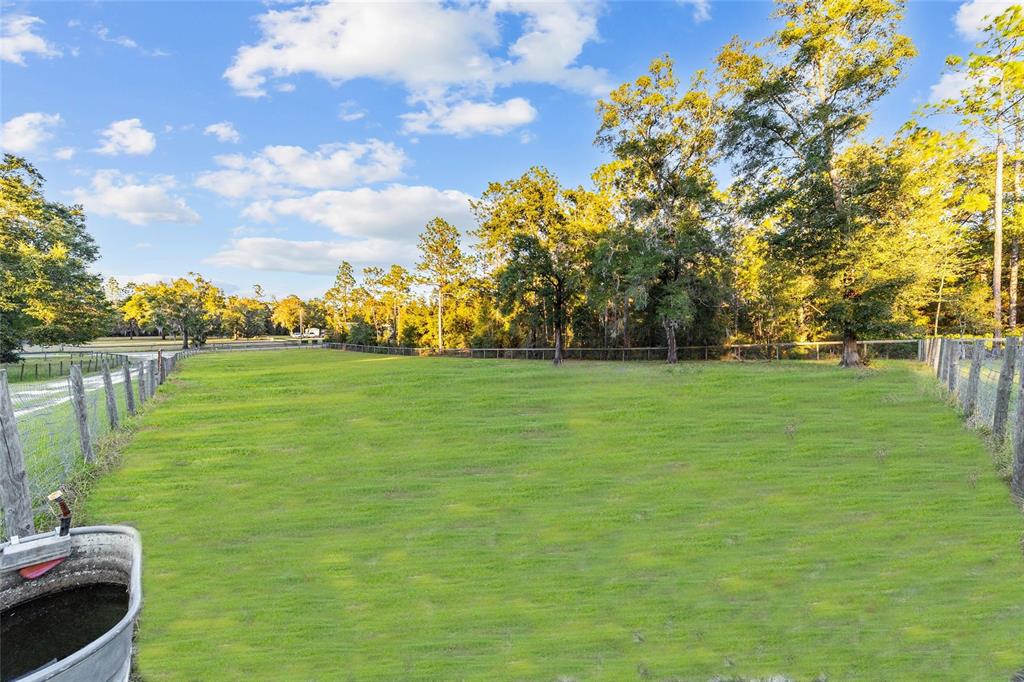 13200 Southwest 95th Street Dunnellon, FL 34432 - Photo 17 of 23 a view of a lake with a yard