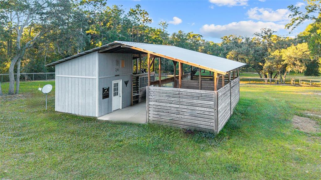 13200 Southwest 95th Street Dunnellon, FL 34432 - Photo 3 of 23 a view of a house with a yard