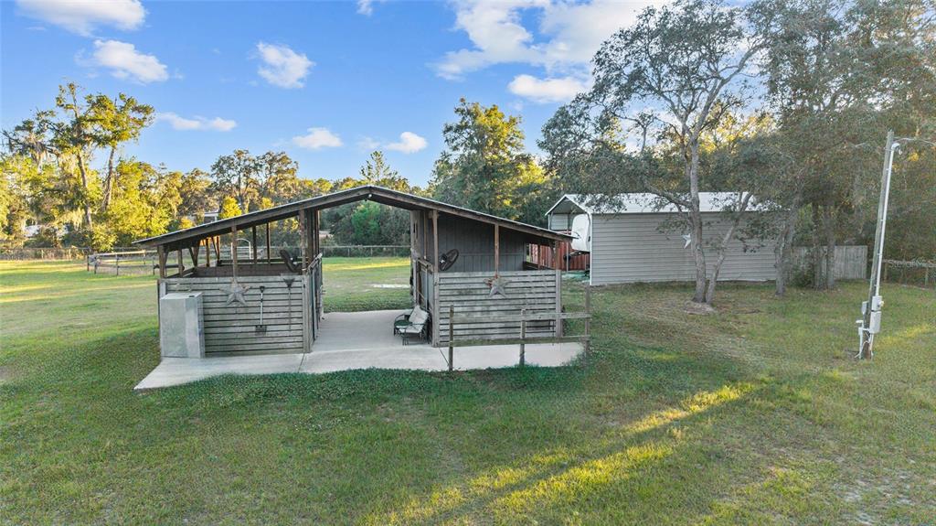 13200 Southwest 95th Street Dunnellon, FL 34432 - Photo 6 of 23 a view of a house with a yard