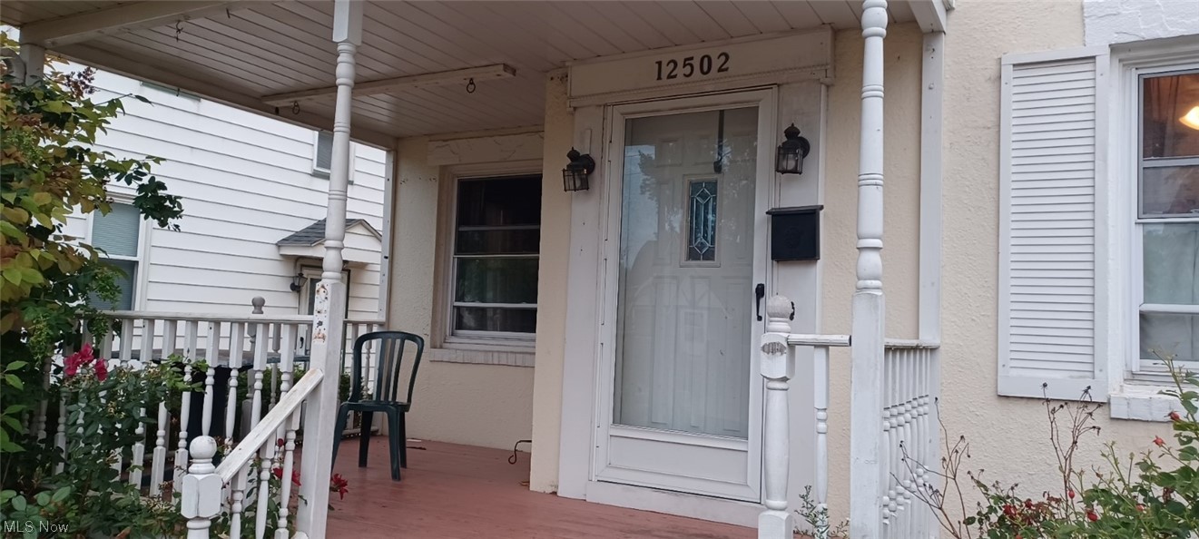 12502 Grannis Road Cleveland, OH 44125 - Photo 2 of 2 Entrance to property featuring covered porch