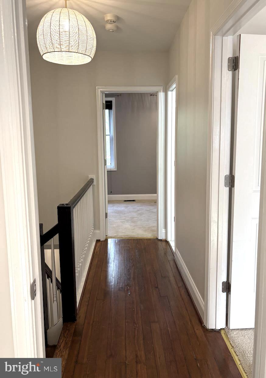 2429 3rd Street Northeast Washington, DC 20002 - Photo 29 of 50 a view of an empty room with wooden floor and a window