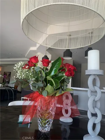 a vase of flowers sitting on a table