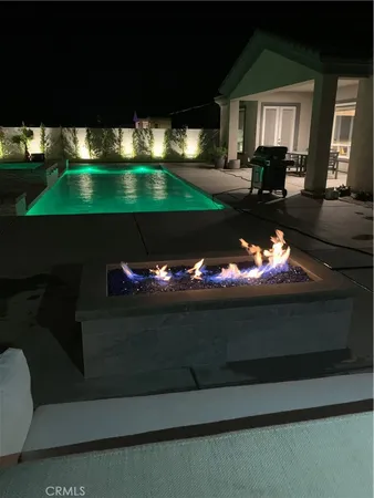 a view of swimming pool from a window