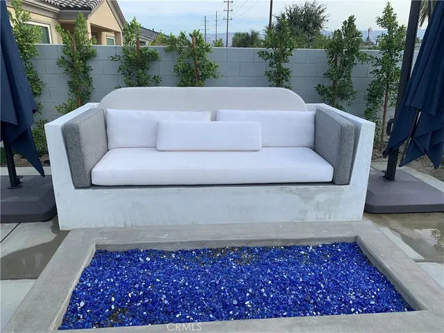 a view of sitting area in back yard