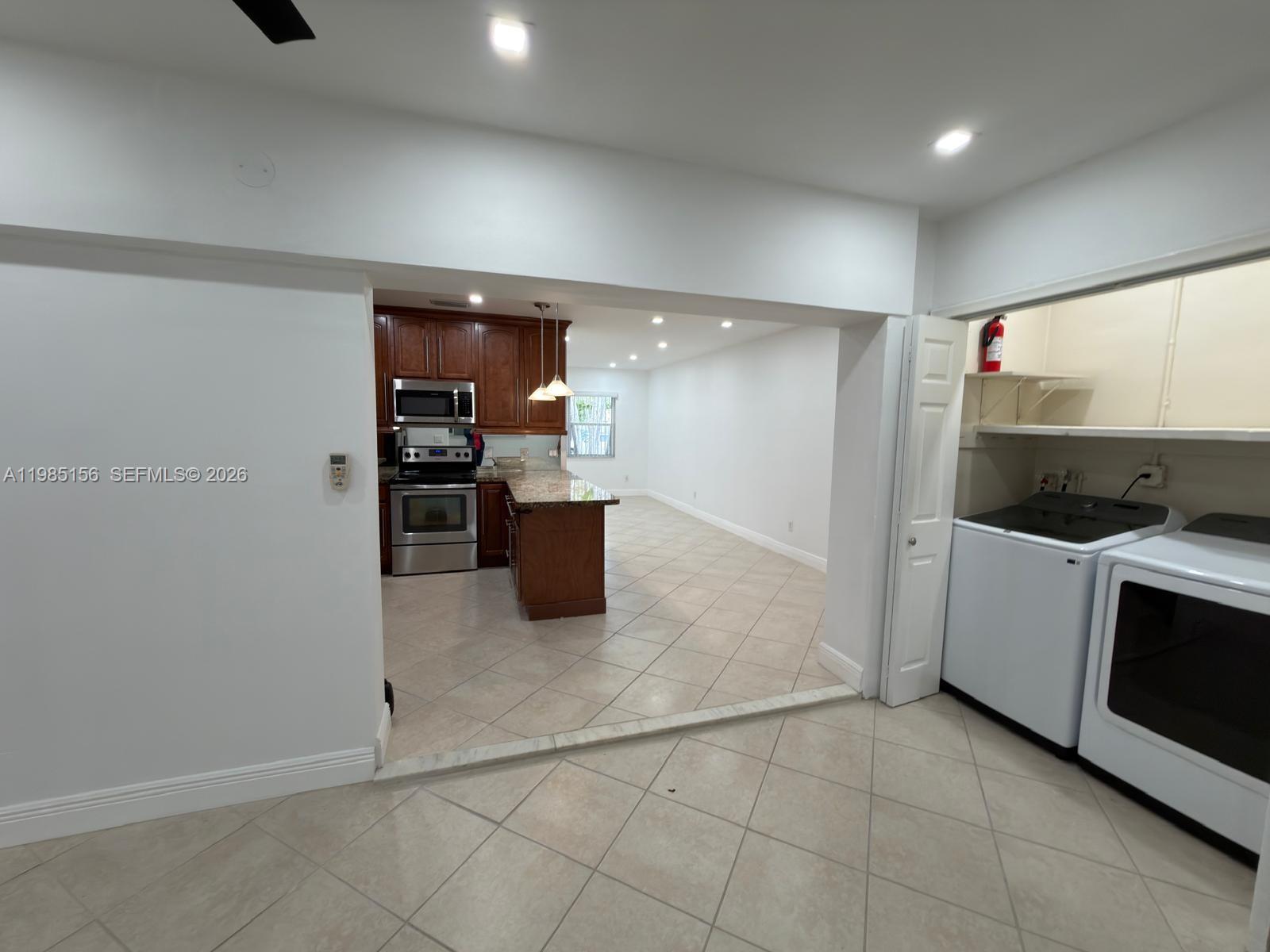 11840 Southwest 81st Road, Unit 1 Pinecrest, FL 33156 - Photo 10 of 19 from family room view