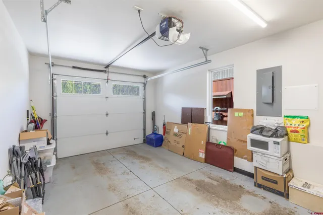 a view of livingroom with furniture and ceiling fan