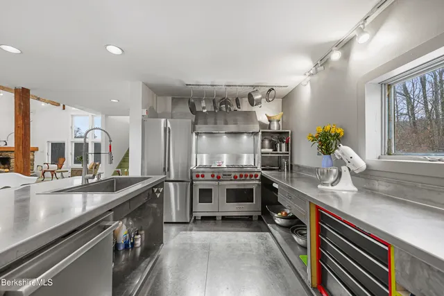 a bed room with a bed and a window