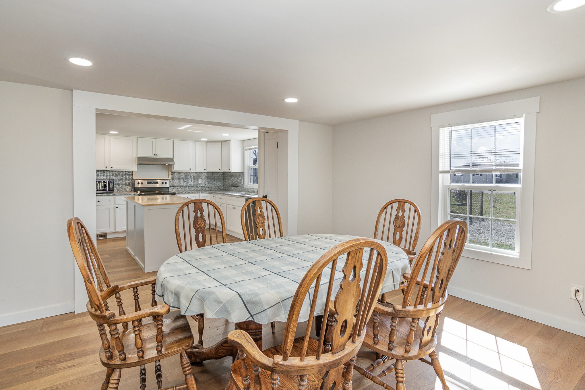 4901 Marion Road Cunningham, TN 37052 - Photo 11 of 35 a view of a dining room with furniture and wooden floor