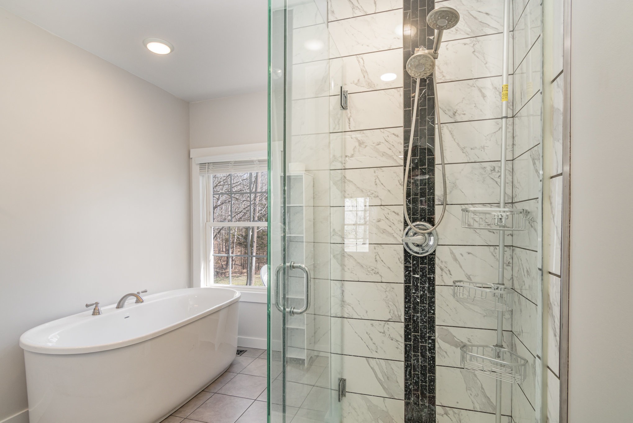 4901 Marion Road Cunningham, TN 37052 - Photo 26 of 35 a bathroom with a sink and a bathtub
