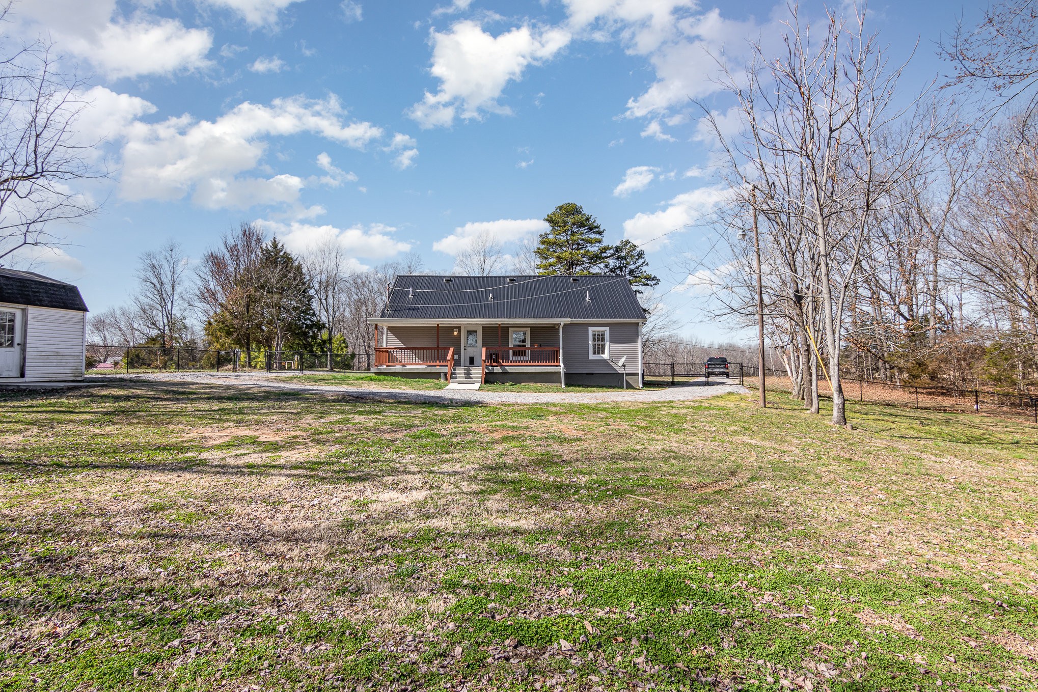 4901 Marion Road Cunningham, TN 37052 - Photo 30 of 35 a front view of house with yard swimming pool and outdoor seating