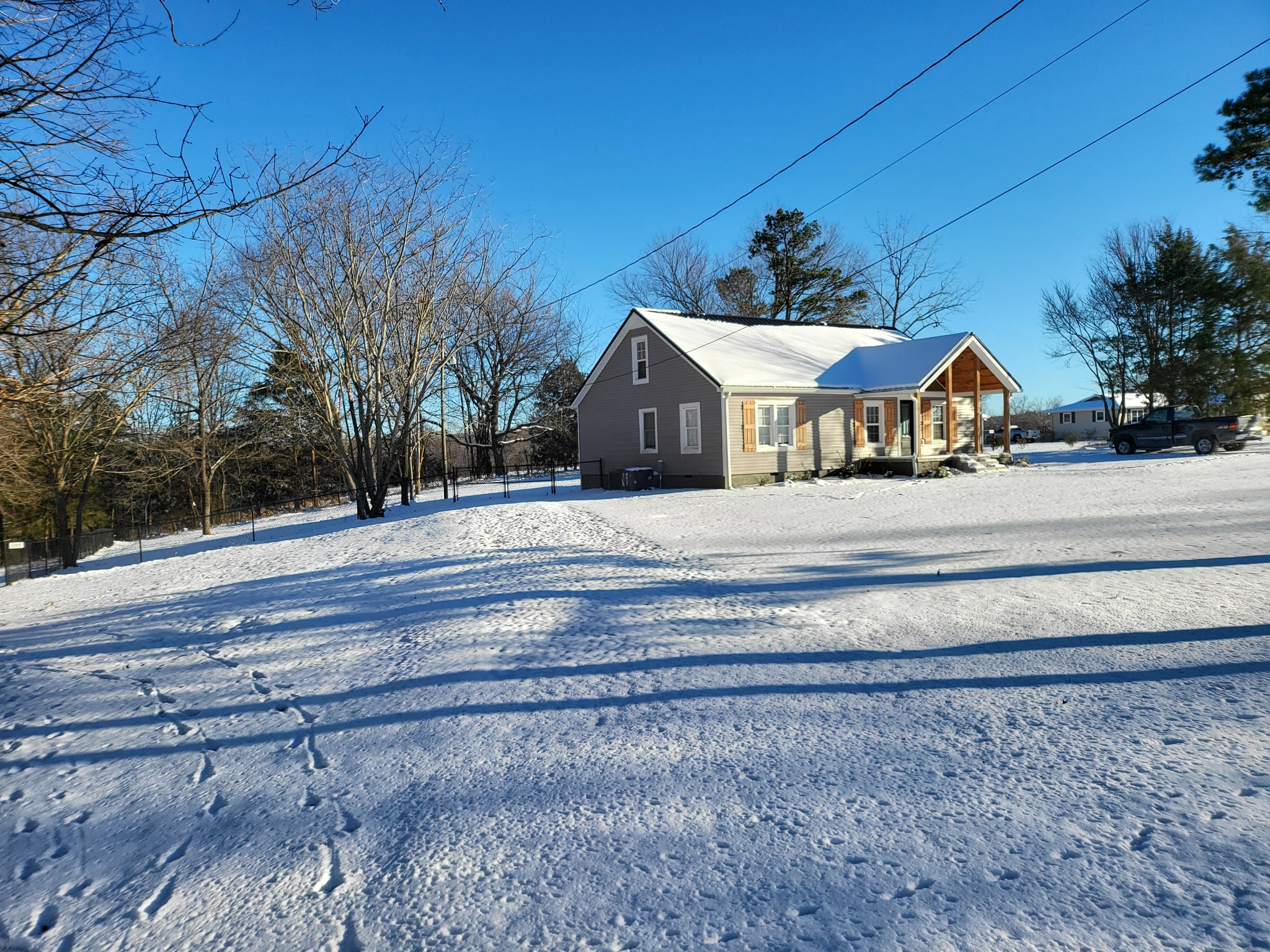 4901 Marion Road Cunningham, TN 37052 - Photo 32 of 35 a front view of a house with a yard